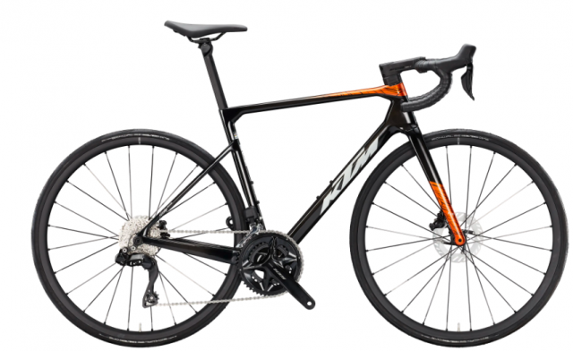 KTM REVELATOR ALTO ELITE CARBON SHIMANO 105 DI2 burnt orange white KOLO